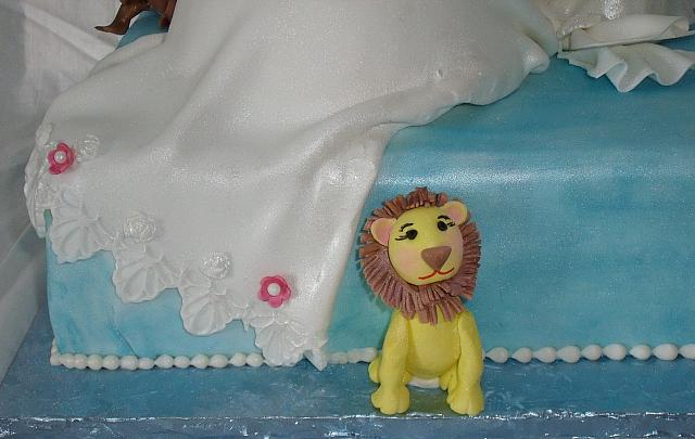 Pregnant Baby Shower Cake close up of edible, handmade Lion