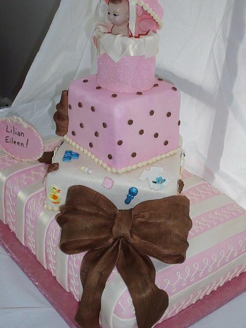 Baby Shower Tiered cake close up of brown textured edible bow