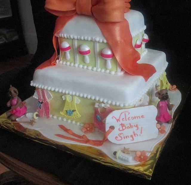 Baby Shower Tiered Cake with Giant Bottle,  Baby Clothes, Baby Rattles, Bears in Tutus Fondant Cake Side View
