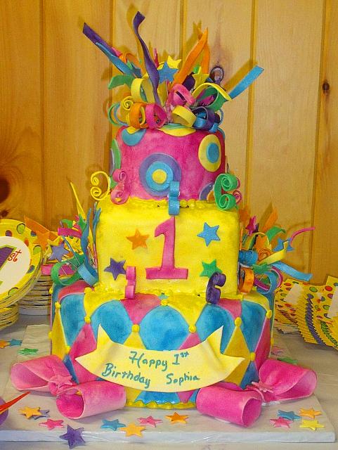 Whimsical Mardi Gras First Birthday Cake front view