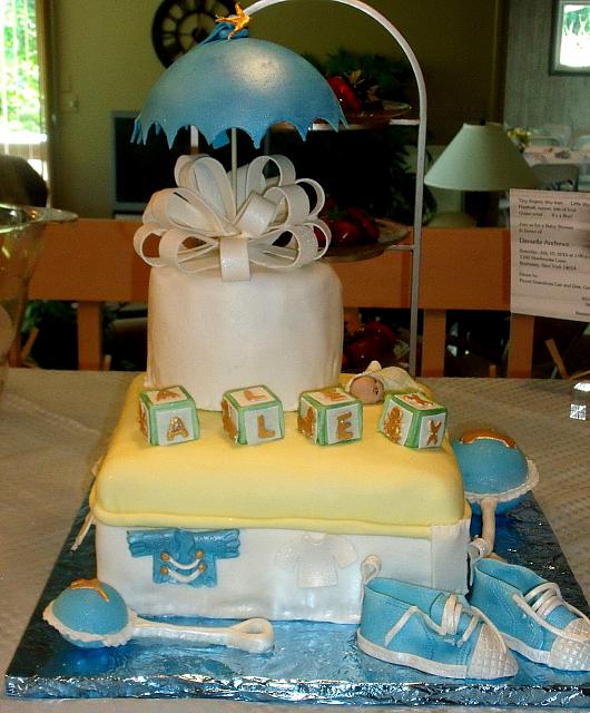 Baby Shower Cake For Boy with Sneakers, Baby Rattle, Umbrella, Baby Blocks, Baby Sleeping side 2