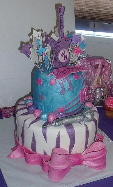 Hannah Montana Cake with Microphone, Exploding Stars, Zebra Stripes, and Large Bow side view