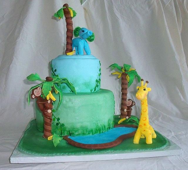 Jungle or Safari Baby Shower Cake with Edible Monkey in Banana Trees, Elephant, Giraffe, and Pond main view