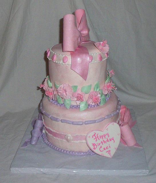 Whimsical Birthday Cake for Girl With Fantasy Flowers, Bows side view