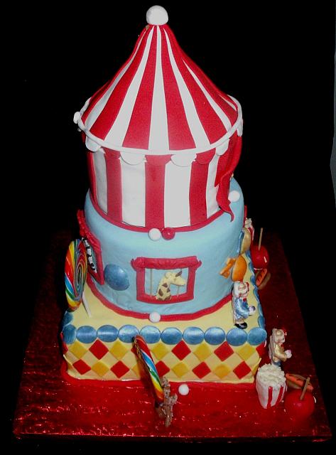 Circus or Carnival Themed Fondant Cake with Edible Clowns, Tent, Animals, and Miniature Carnival Food side view