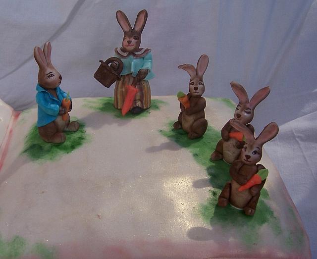 Close-close up of Mrs. Rabbit, Peter Rabbit, Flopsy, Mopsy, and Cottontail  gumpaste decorations