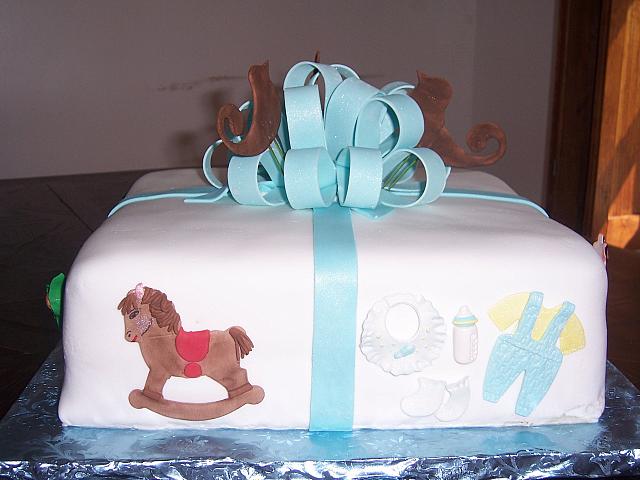 Baby Shower Present Cake with Rocking Horse and Baby Clothes