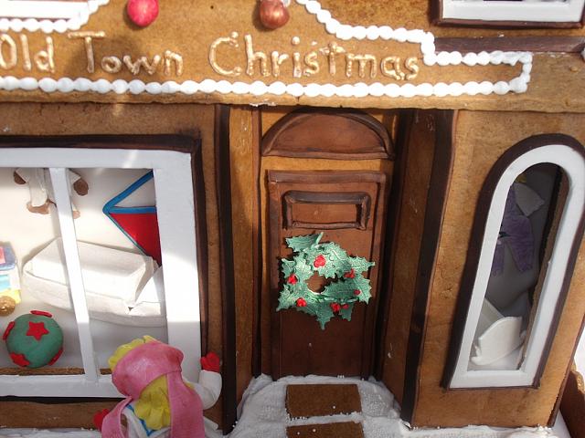 close up of gingerbread storefront entrance door