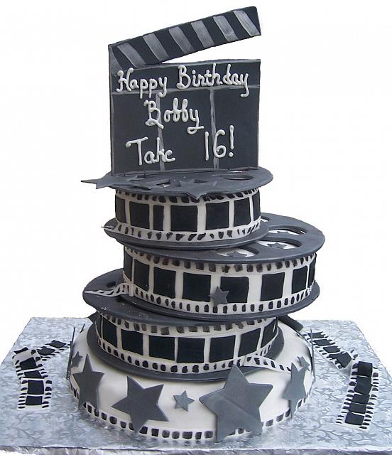 CLICK ON THE CAKE TO ENLARGEN THE PHOTO. This is a birthday cake for Bobby Jones of Rochester, NY, who had his 16th birthday party at Salmon Creek Country Club in February 2007. Bobby loves movies and designed this cake with his parents Susan and Don.