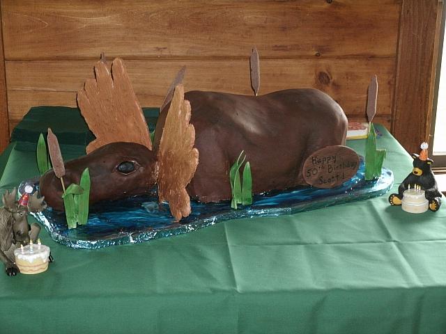 Carved Moose Cake Sitting In Pond view 1
