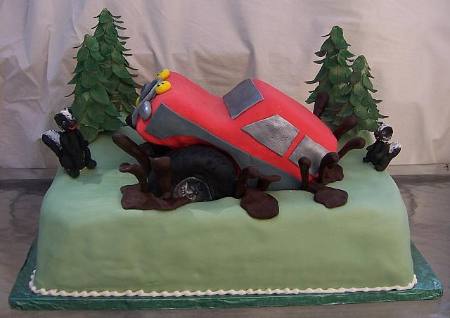 Groom's Cake with Off Road Truck with edible skunks, truck, trees, chocolate mud