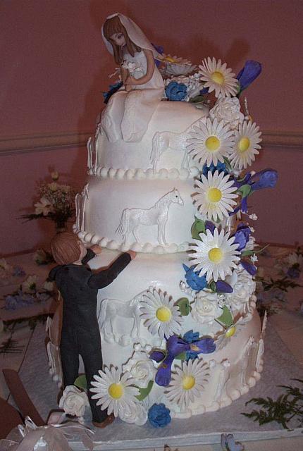Wedding cake with handmade gumpaste bride and groom