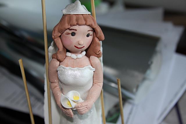 Fireman Wedding Cake Bride Close Up 1