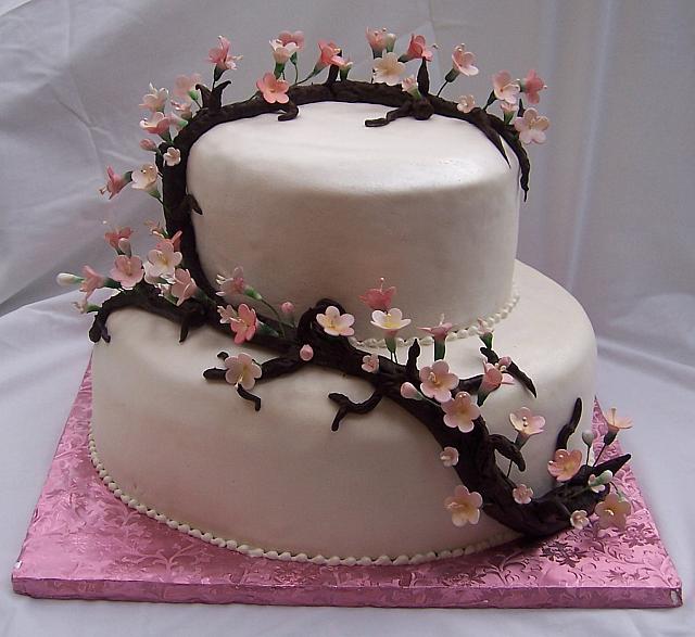 Asian themed wedding cake with sugarpaste(also known as gumpaste) cherry blossoms