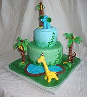 Jungle or Safari Baby Shower Cake with Edible Monkey in Banana Trees, Elephant, Giraffe, and Pond view 1