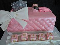 Baby Shower Princess Theme Fondant Cake with Crown, Quilted Sides, Baby Blocks, 
Edible Sleeping Baby, Jeweled Bow front view
