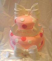 Pink Cake With Polka Dots and edible gumpaste White Bows and banner View 2