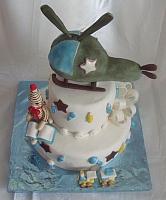Baby Boy Cake with Edible Helicopter as well as  Edible Sock Monkey, Bow, Train, Baby Rattles, Baby Bottles - top view