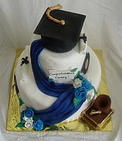 Blue and White Graduation Cake With Music Theme top view