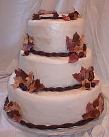 Fall Leaves Wedding Cake with Burgundy, Brown, and Beige Edible Gumpaste Leaves and Dark Chocolate Acorns view 2
