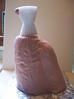 view 1 of cake with styrofoam bodice and fondant bust