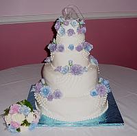 Valentina Wild's Wedding Cake With Pastel Blue and Pastel Purple Roses
